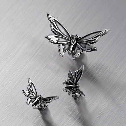 ETERNAL MOTH EAR STUDS