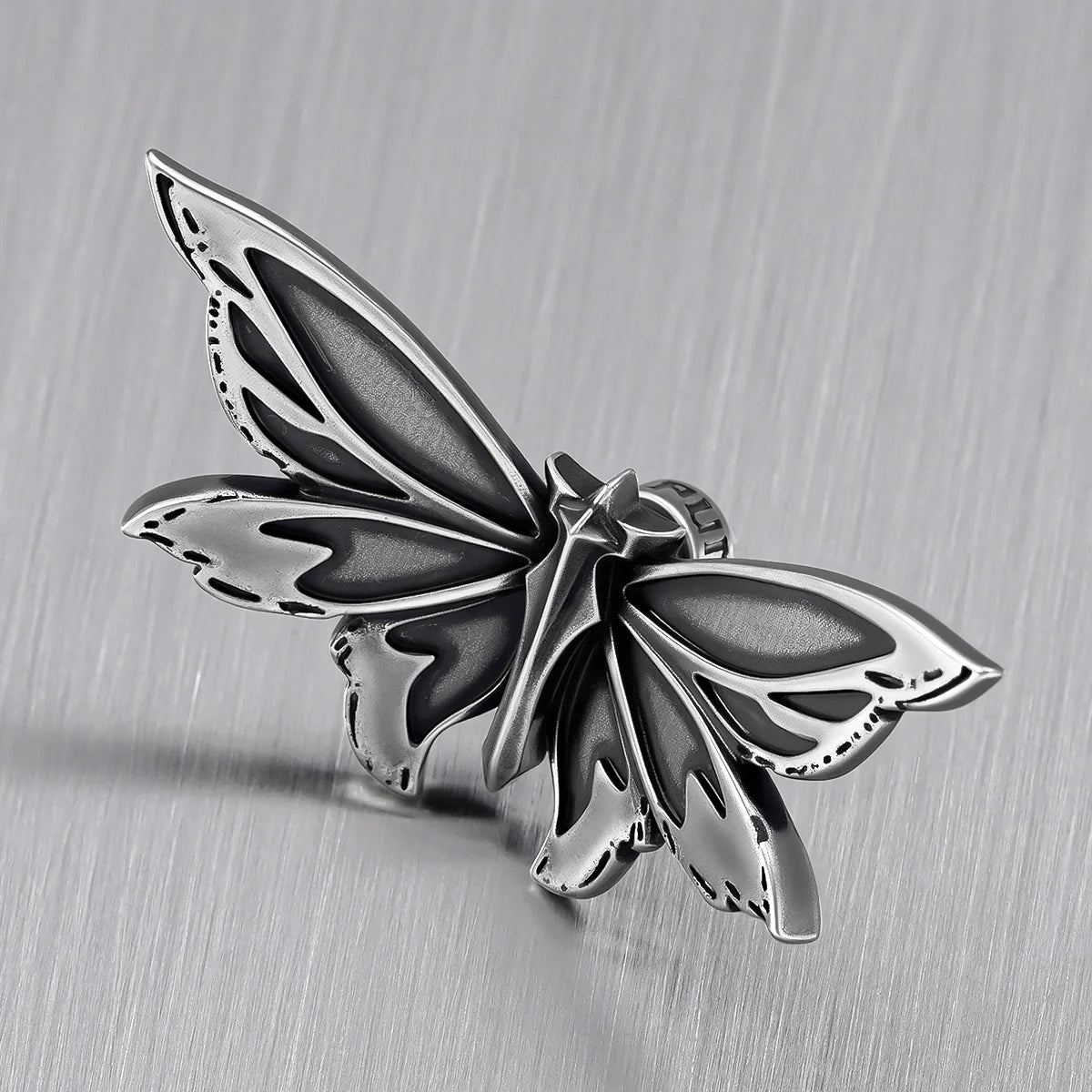 ETERNAL MOTH EAR STUDS