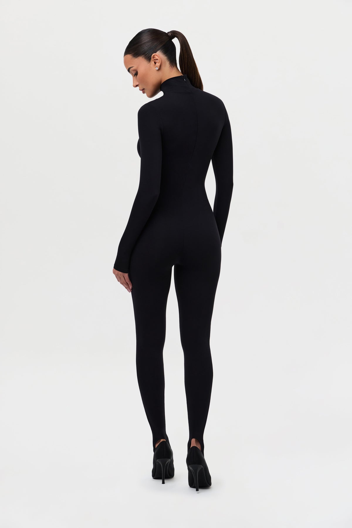 Naked Turtleneck Stirrup Jumpsuit