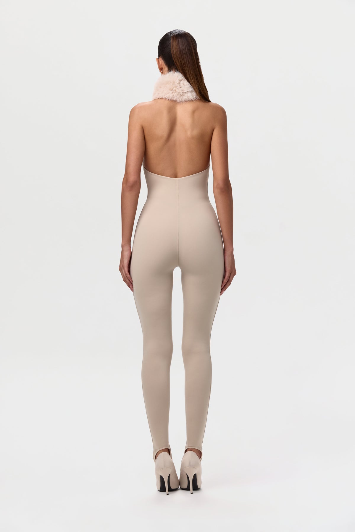 Naked Stirrup Jumpsuit with Fur Collar