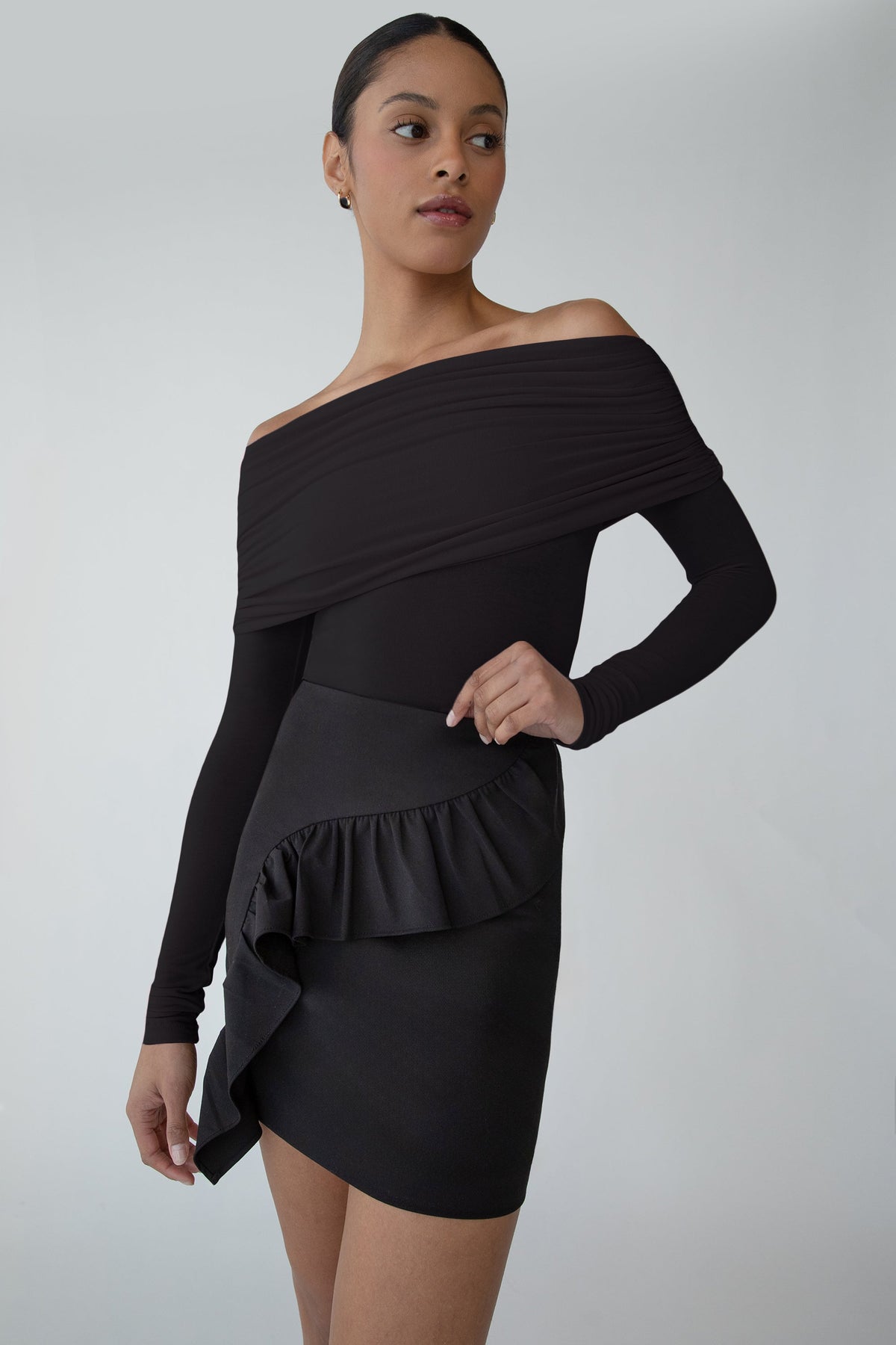 MINI SKIRT WITH CURVED RUFFLE