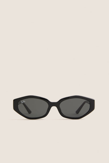 Black RB4473D Sunglasses with chunky frames and etched Ray-Ban logo, offering a classic, high-end look for effortless style and fun, confident wear.