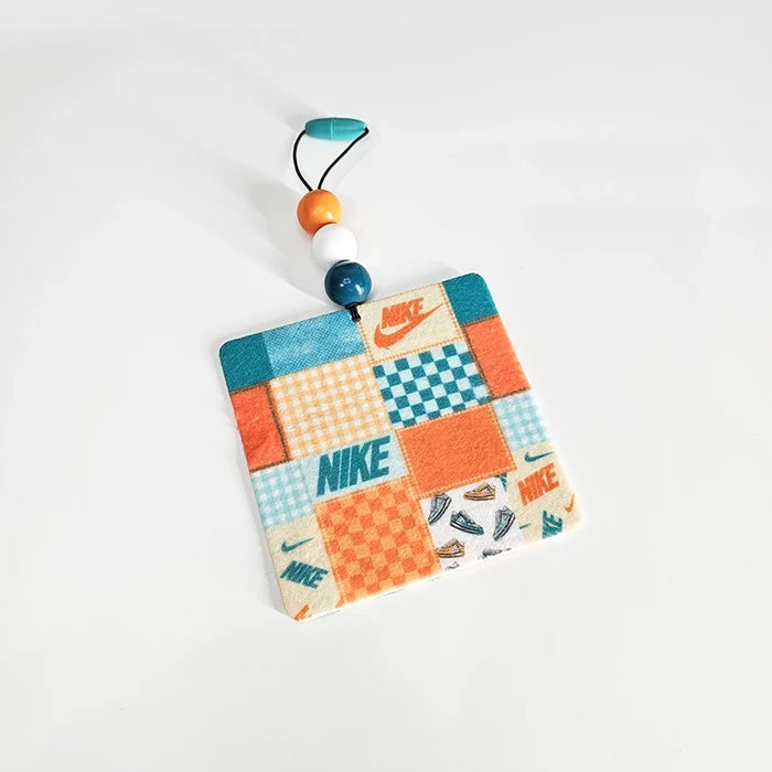 Fresh Kicks colorful sneaker-inspired felt car air freshener with teal orange and white decorative beads