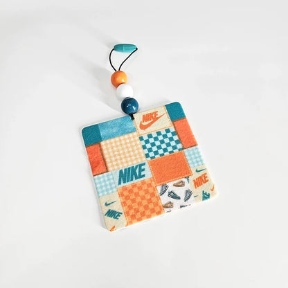 Fresh Kicks colorful sneaker-inspired felt car air freshener with teal orange and white decorative beads