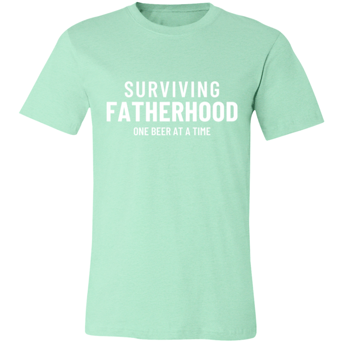 Surviving Fatherhood One Beer At A Time graphic t-shirt in Heather Mint